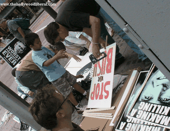 Making signs at the anti war march in Los angeles ca. 092405