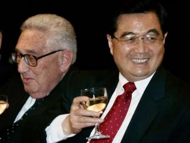 Hu Jintao, and Henry Kissinger tip one back