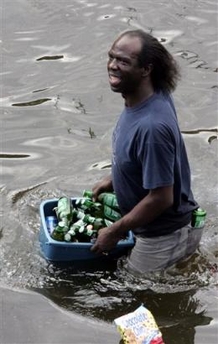 New Orleans if flooded Katrina is over. Might as well grab some beer 082805